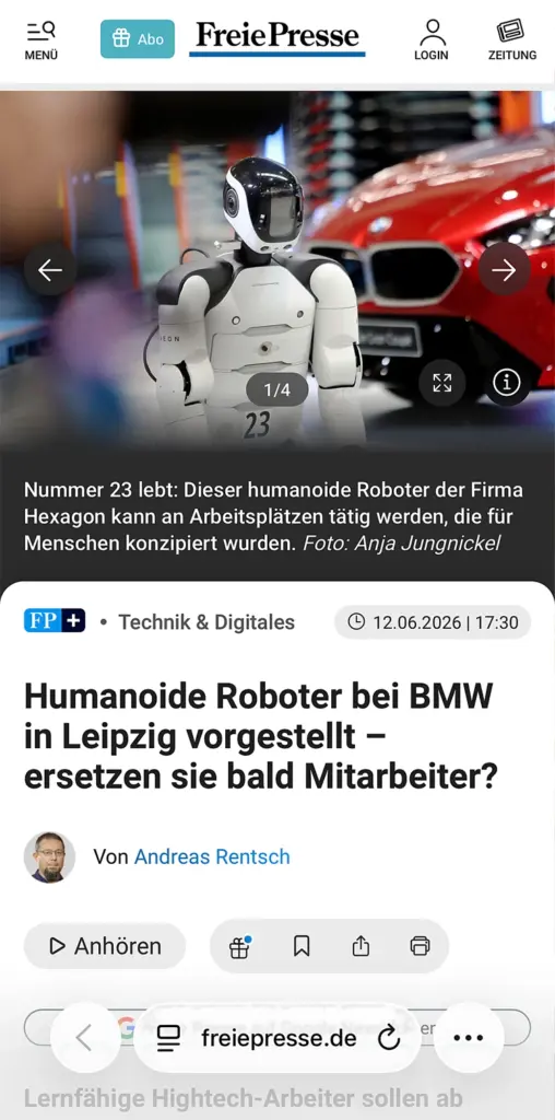 Screenshot eines Online-Artikels der Freien Presse vom 12.06.2026 mit der Überschrift "Humanoide Roboter bei BMW in Leipzig vorgestellt – ersetzen sie bald Mitarbeiter?". Das Hauptfoto von Anja Jungnickel zeigt einen humanoiden Roboter der Firma Hexagon mit der Nummer 23 vor einem roten BMW in einer Produktionshalle. Darunter steht der Fotonachweis "Foto: Anja Jungnickel".